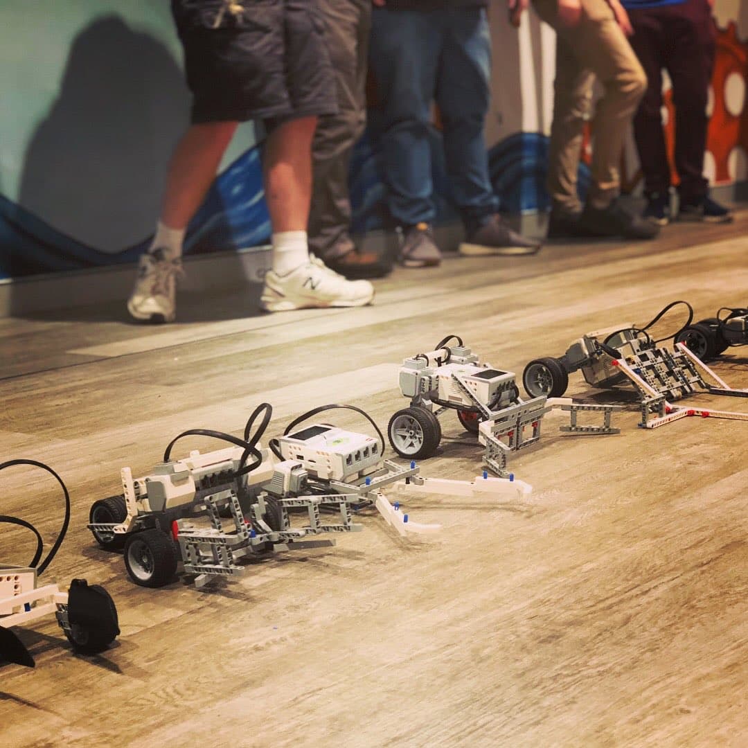 Children building and testing robots at TinkerTank