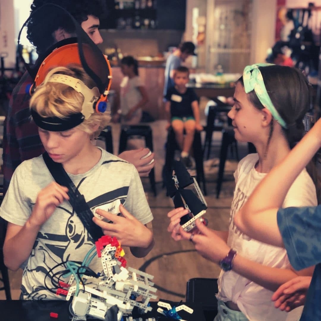 Children building a robotics project at TinkerTank